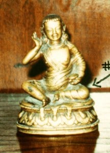 Antique Tibetan gold colored Buddha image