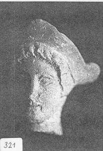 Broken Head of Sculpture with Ringlets Falling out of Hat image