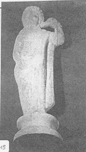 Clay Statue of Standing Figurine Wearing Crown image