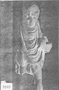 Clay Statue of Standing Male with Angry Features image