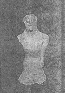 Clay Statue of Woman Standing and Dressed image