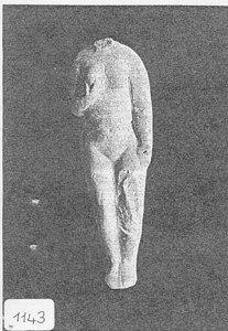 Female Figurine in pose with right hand on right breast image